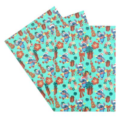 Stitch - Geschenkpapier mit Weihnachtsmotiven